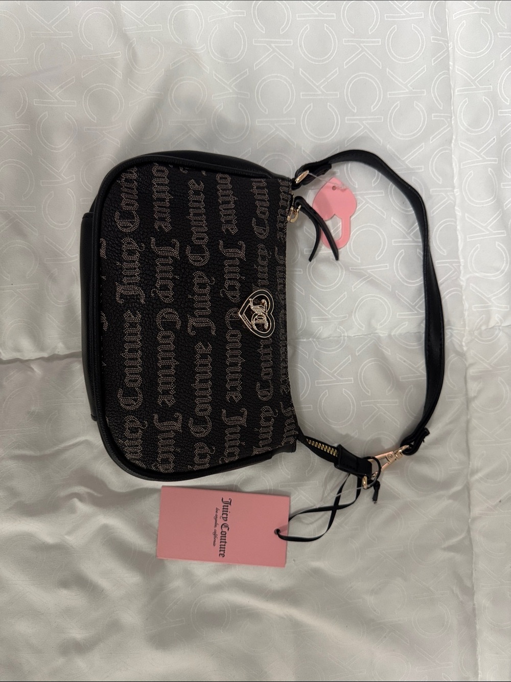 Juicy Couture Black Crossbody with Pink Tag and Gold Heart Accent